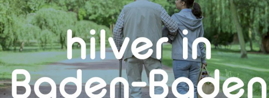 Zwei Senioren laufen im Grünen. Darüber steht der Schriftzug "Hilver in Baden-Baden".